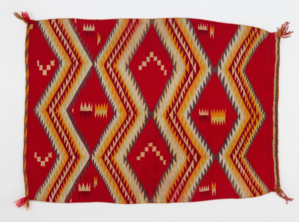 red background; zigzagging bands gray